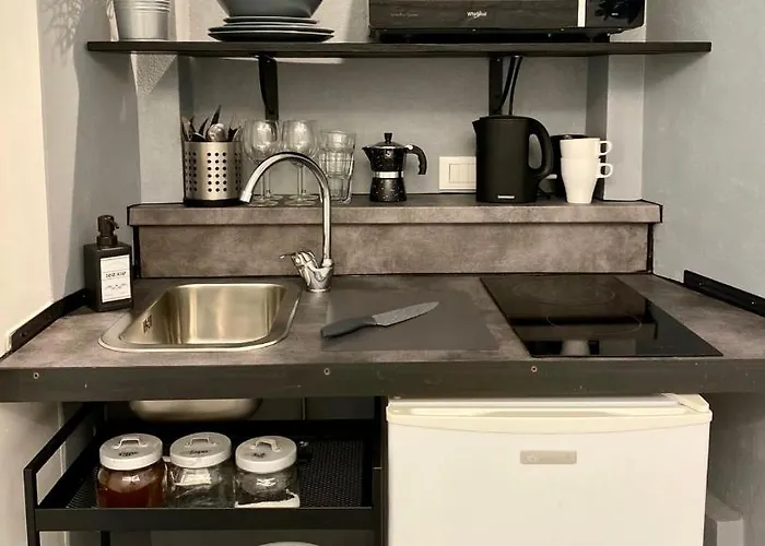 L Essenziale A Апартаменти